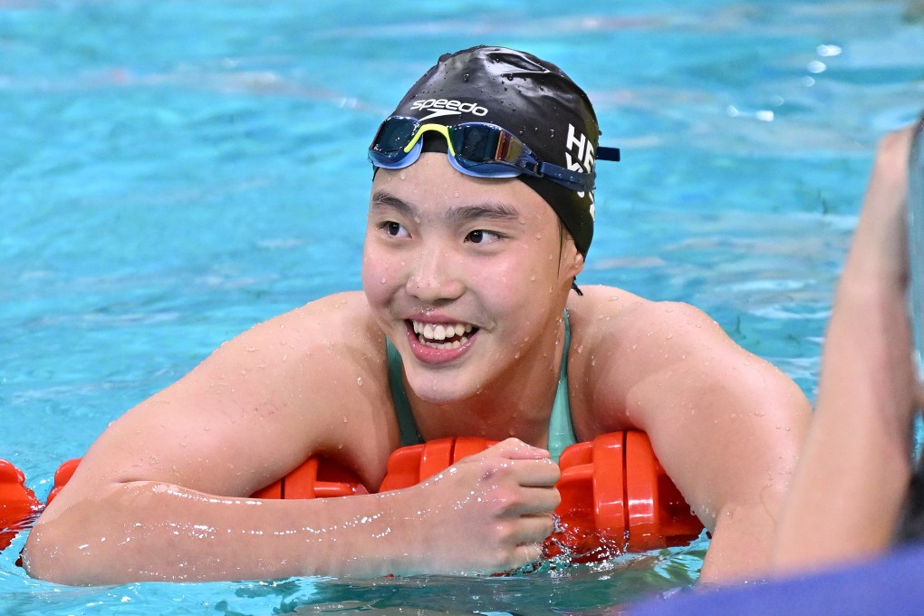Yu Zidi is all smiles after her record-breaking swim in Shenzhen. Photo: Xinhua