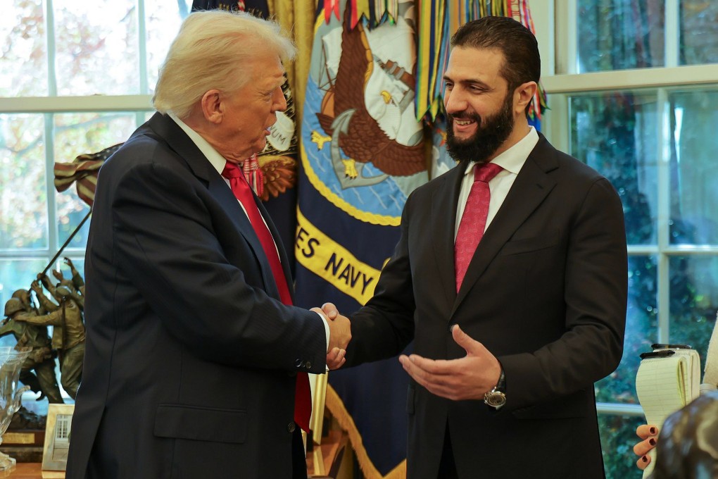 US President Donald Trump shakes hands with Syria’s President Ahmed al-Sharaa in the Oval Office. Photo: Syrian Presidency Press Office via AP