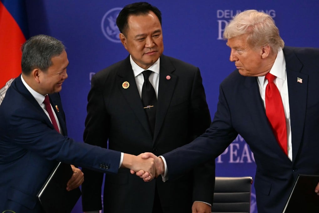Thailand’s Prime Minister Anutin Charnvirakul (centre) looks on as Cambodian Prime Minister Hun Manet (left) shakes hands with US President Donald Trump on the sidelines of the Asean summit in Kuala Lumpur, Malaysia, on October 26. Photo: EPA
