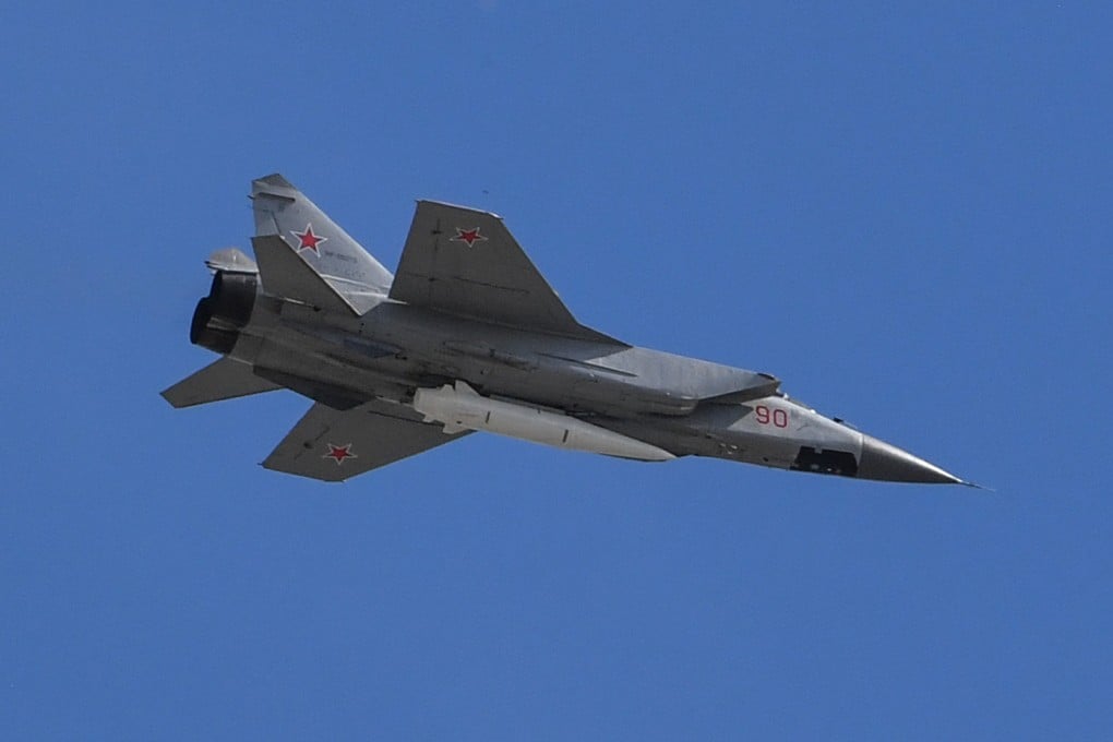 A Russian MiG-31 jet carrying hypersonic Kinzhal missile flying above Moscow in 2018. File photo: AFP
