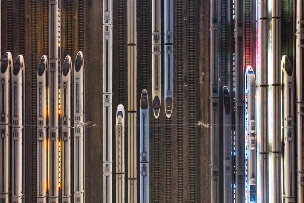 High-speed trains are lined up near a station in China’s eastern Jiangsu province. China aims to encourage more private investment in major projects, including new railways and nuclear power facilities. Photo: AFP