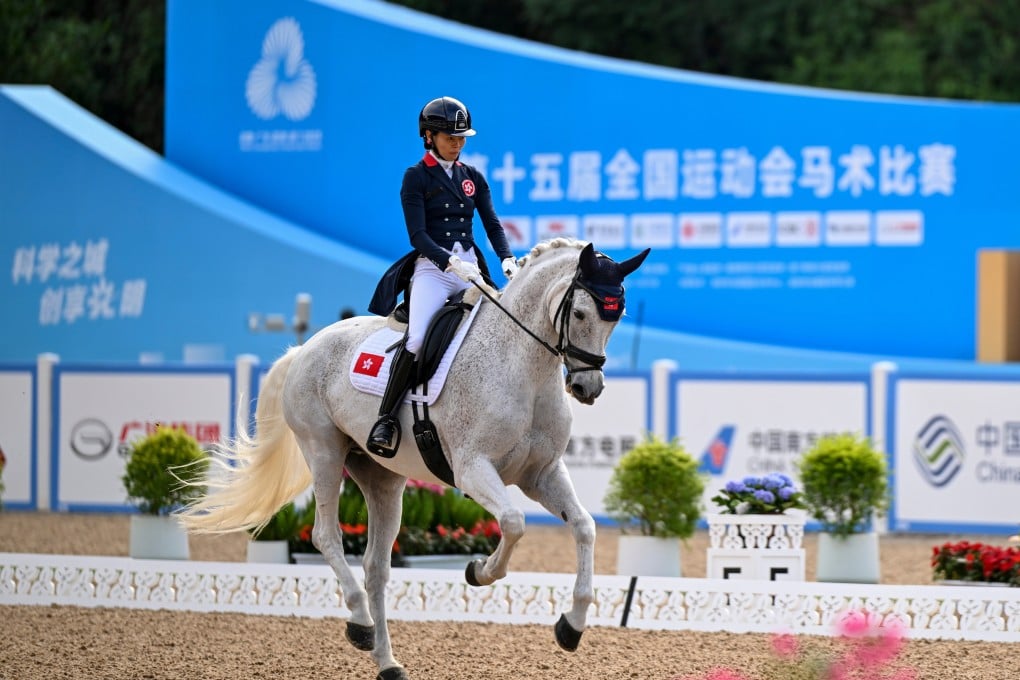Hong Kong’s Annie Ho and her horse, Lord Sandro K, finished seventh in the individual dressage final. Photo: Xinhua