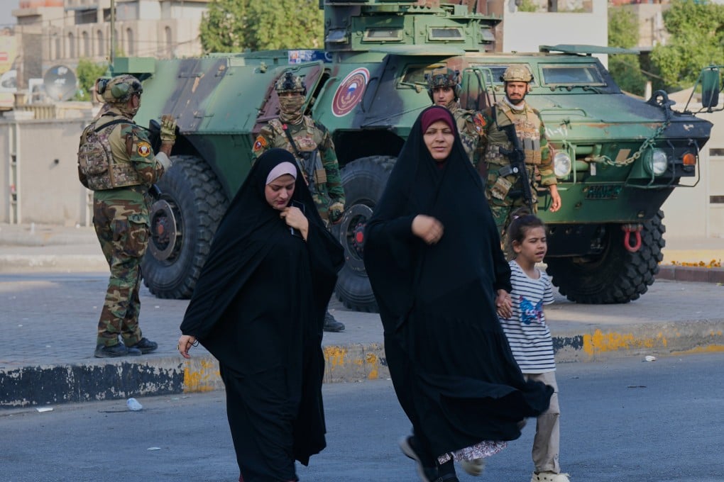 Iraqi soldiers patrol Sadr City, Baghdad, during parliamentary elections on Tuesday. Photo: AP