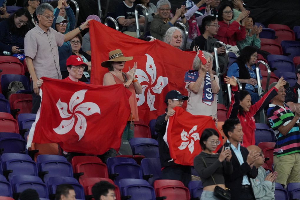 Hong Kong fans cheer on the women’s team during the National Games rugby sevens tournament at Kai Tak Stadium. Photo: Elson Li
