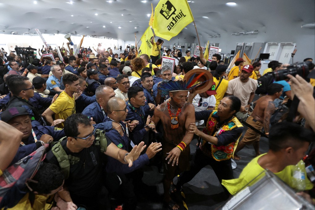 Demonstrators, including Indigenous people force their way into the venue hosting the Cop30 summit in Belem, Brazil. Photo: Reuters