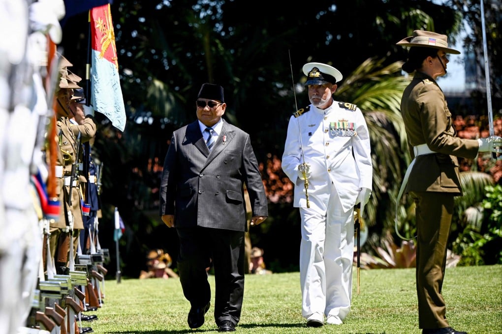 Indonesian President Prabowo Subianto inspects a guard of honour at Admiralty House in Sydney on Wednesday. Photo: AFP