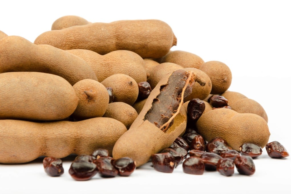 Tamarind might not look appetising, but the sour, sweet fruit adds flavour to Southeast Asian dishes from pad Thai to assam laksa. Photo: Shutterstock