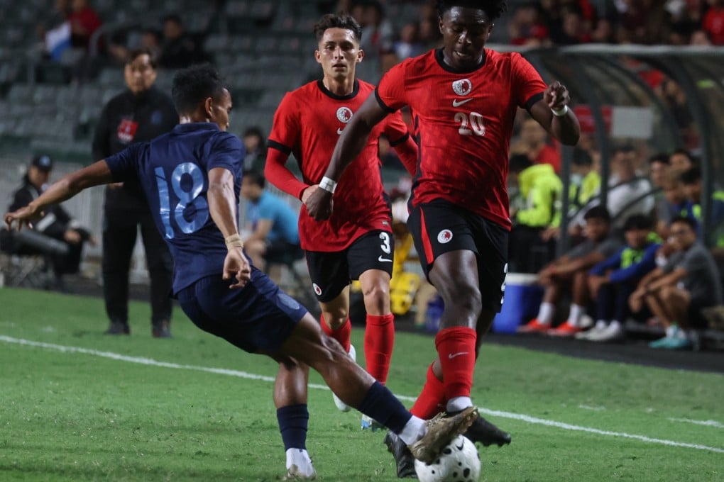 Michael Udebuluzor (right) in action during Hong Kong’s 1-1 draw with Cambodia on Thursday. Photo: Edmond So
