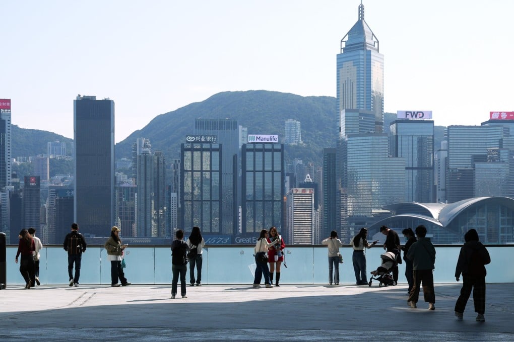 People take in the view of Hong Kong’s skyline from K11 Musea in Tsim Sha Tsui on February 10. Photo: Eugene Lee