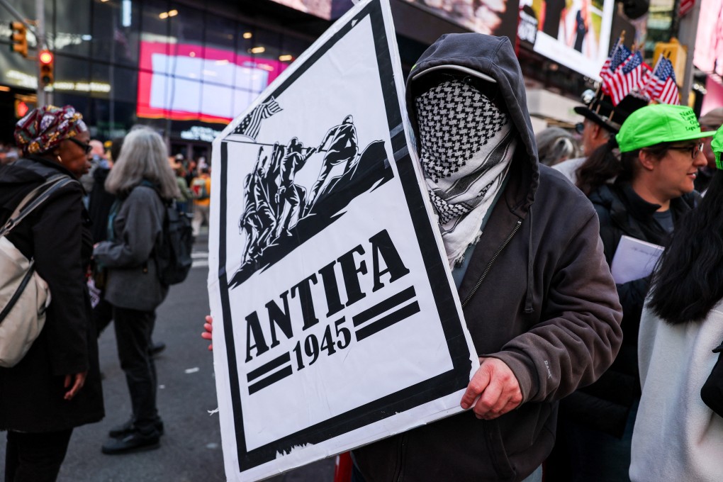 A demonstrator holds an ‘antifa’ placard at a ‘No Kings’ protest against US President Donald Trump’s policies, in New York City in October. Photo: Reuters