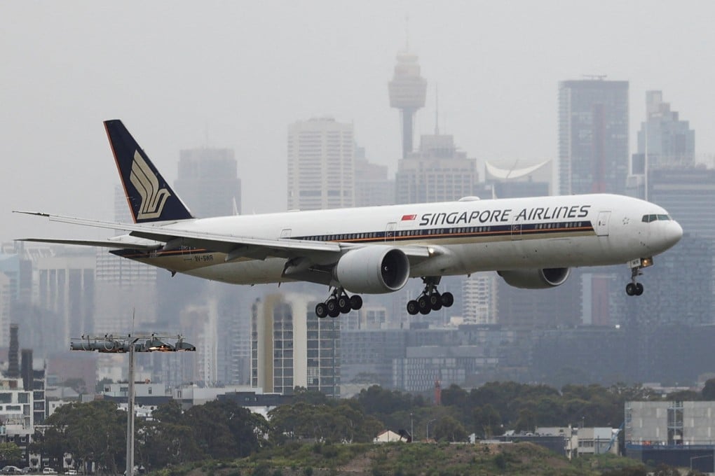 A Singapore Airlines plane arrives at the international terminal at Sydney Airport. Photo: Reuters