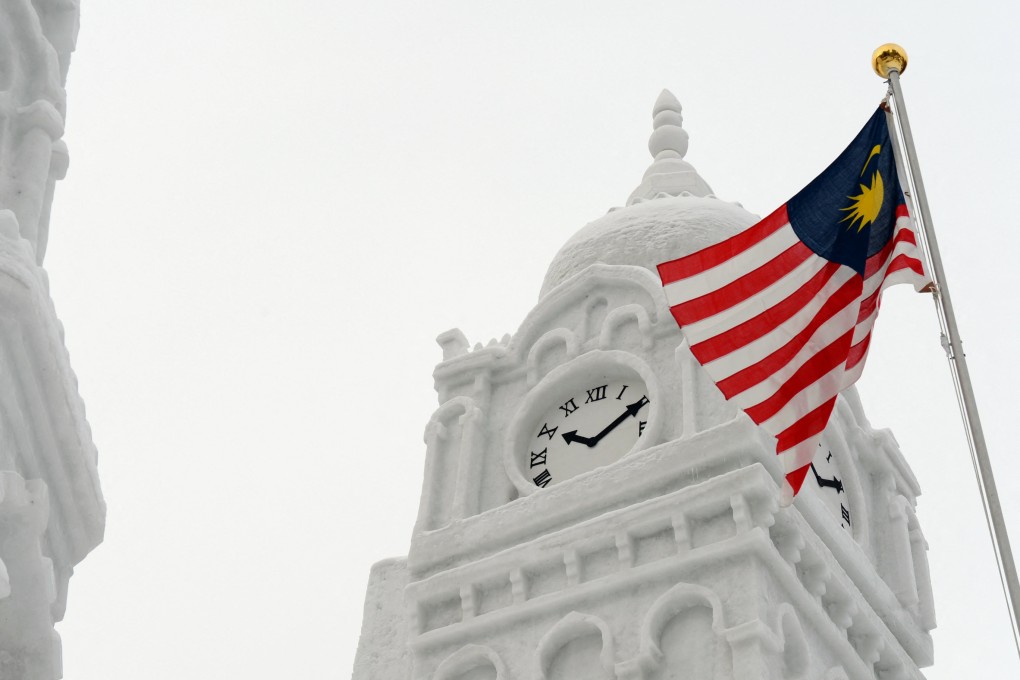 Malaysia’s national flag is seen next to a sculpture at a snow festival in Japan. Asia faces a venture capital “winter”. Photo: AFP