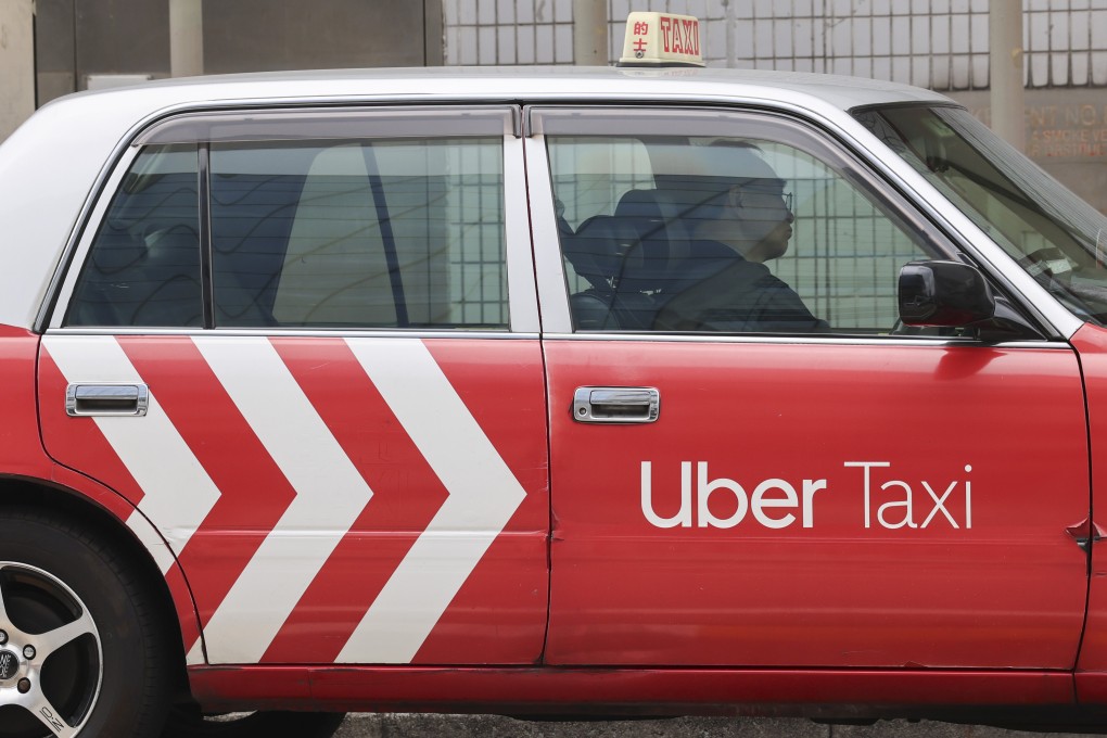 An Uber taxi waits at stand outside Kowloon Tong MTR station. Photo: Jelly Tse