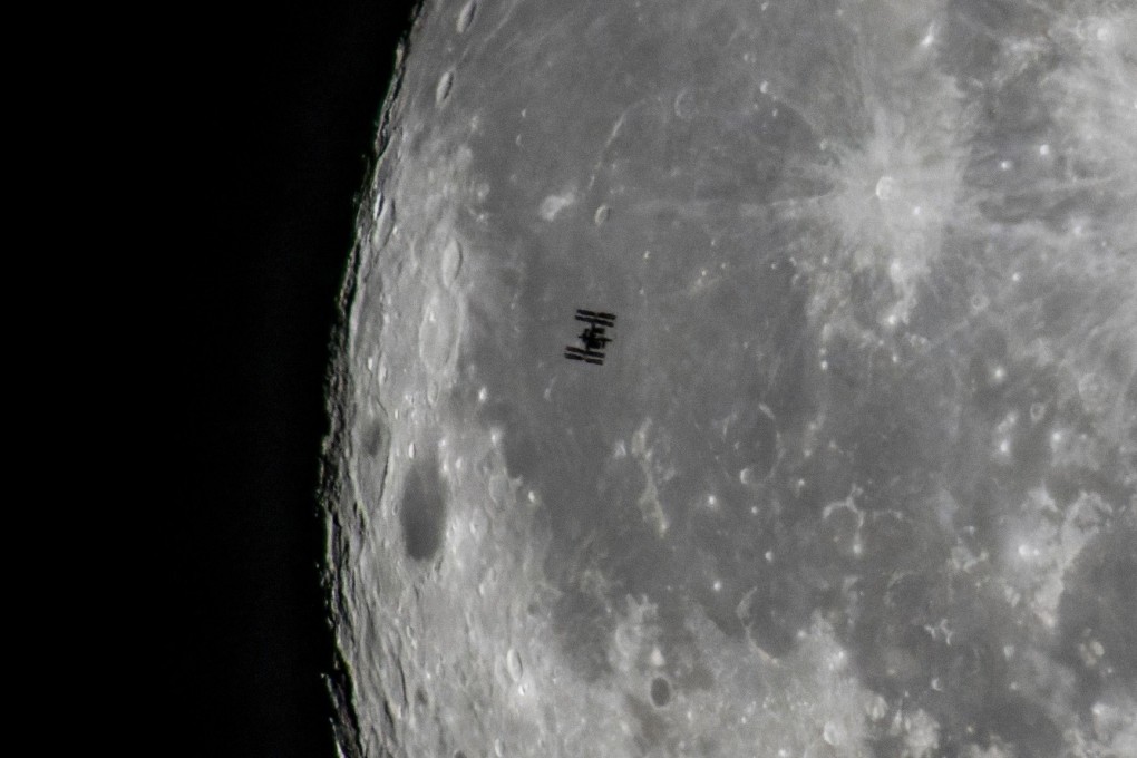 The International Space Station orbiting Earth, in the foreground of the moon. Photo: EPA