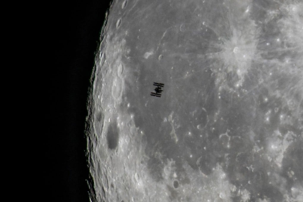 The International Space Station orbiting Earth, in the foreground of the moon. Photo: EPA