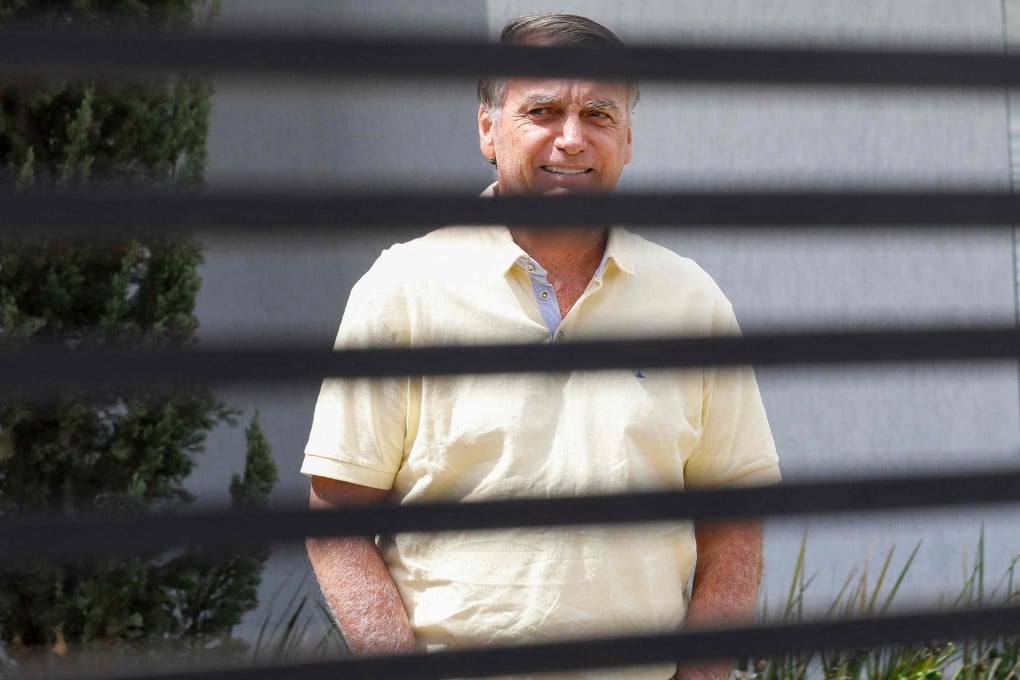 Former Brazilian president Jair Bolsonaro is seen inside his residence in Brasilia, where he has been under house arrest since August. Photo: AFP