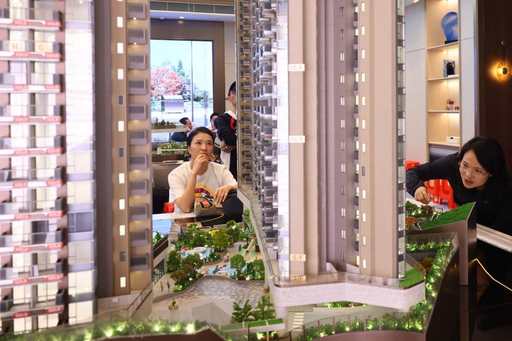 Potential homebuyers are seen at the Tsim Sha Tsui showroom of The Reserve at Gold Coast Bay in Tuen Mun. Photo: Dickson Lee