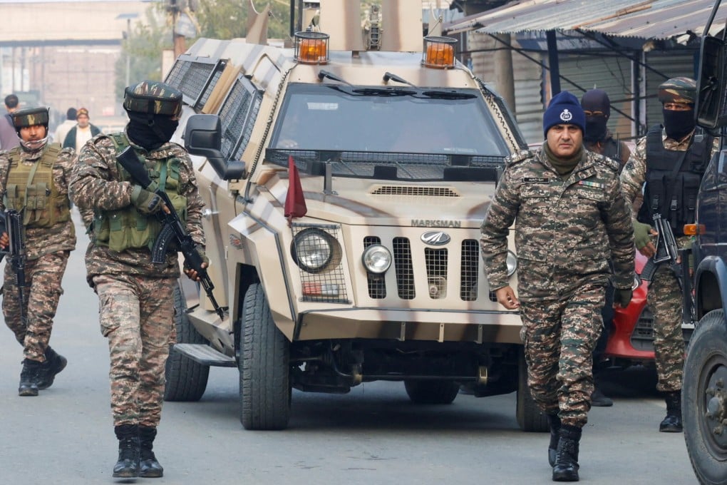 Indian security forces arrive near the site of an explosion inside a police station in Srinagar on Saturday. Photo: Reuters