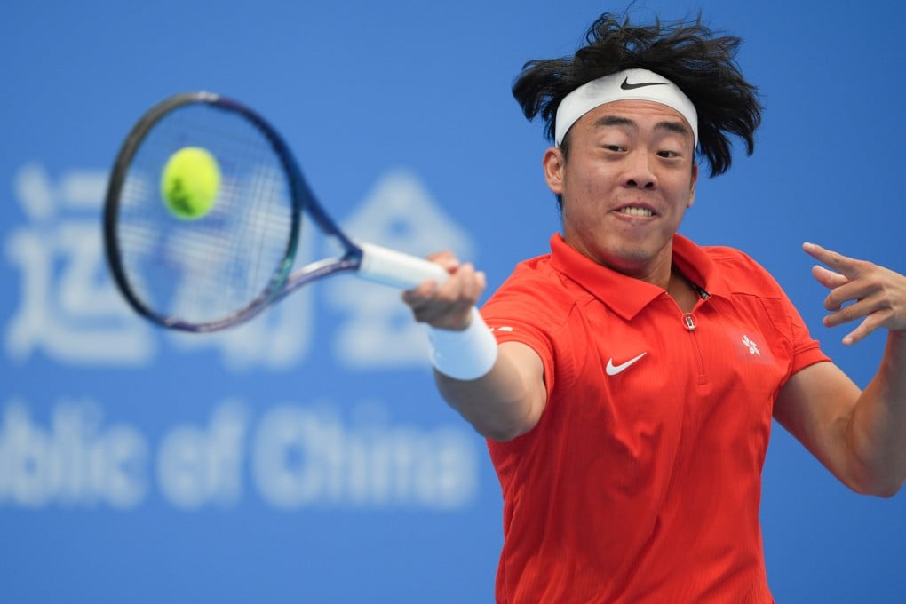 Coleman Wong connects with his ‘bomb of a forehand’ during his National Games first-round victory over Duan Hao. Photo: Eugene Lee