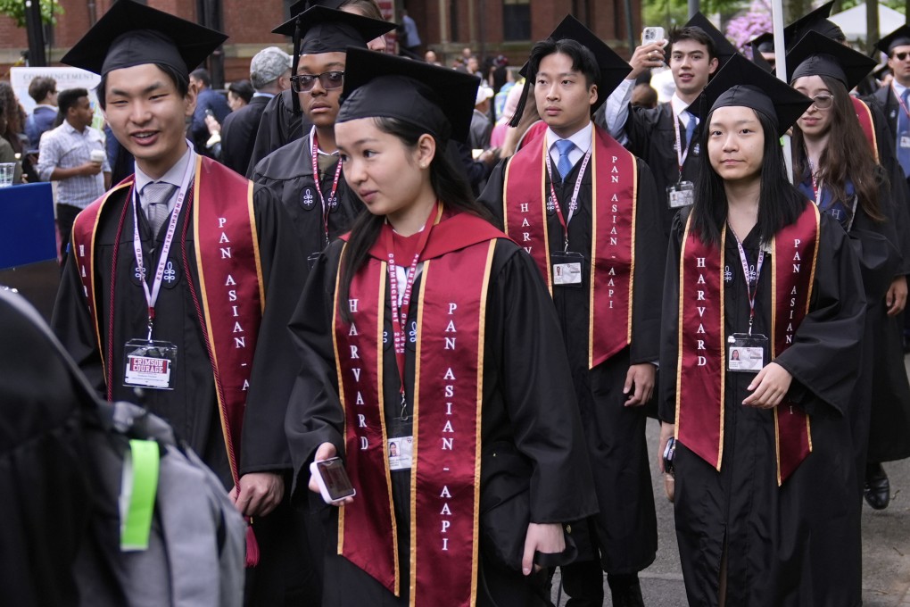Chinese students attend a graduation ceremony at Harvard University in Cambridge, Massachusetts. A new report has revealed that fewer Chinese are studying in the US. Photo: AP