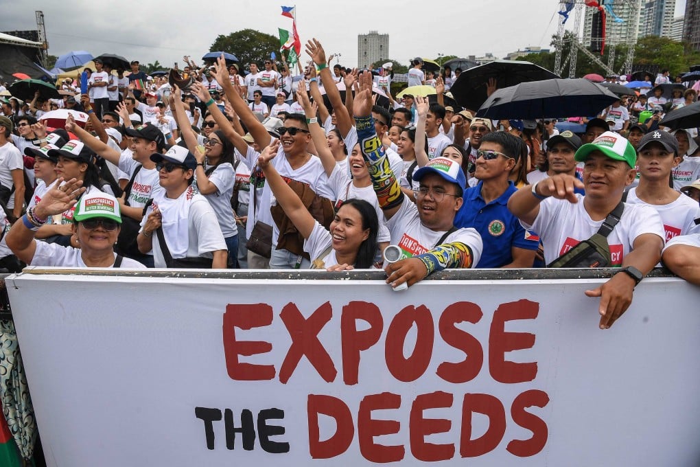 Iglesia ni Cristo members attend an anti-corruption protest at a park in Manila on Sunday. Photo: AFP