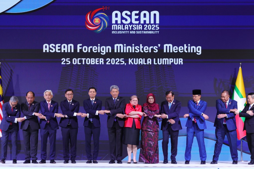 Asean foreign ministers pose for a group photo during a meeting ahead of the Asean Summit in Kuala Lumpur on October 25. Photo: EPA