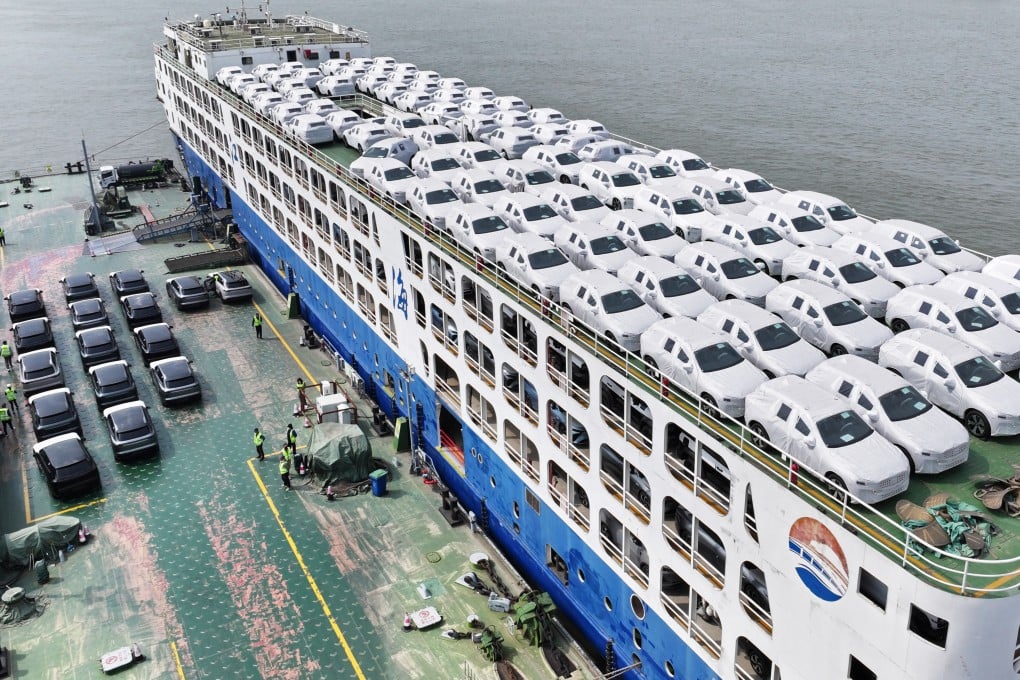 Vehicles are seen loaded on a cargo ship for export at Wuhu Port, Anhui province. Photo: Getty Images