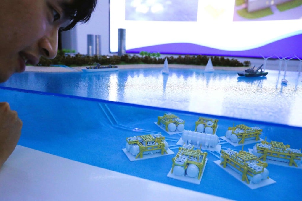 A visitor observes a miniature model of data cabins for an undersea data centre in Lingshui, in south Hainan province, on September 25. Photo: Xinhua