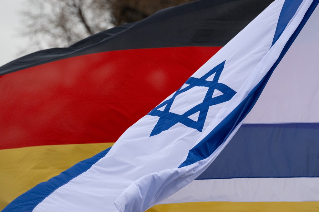 The flags of Germany and Israel wave in the wind in front of the Saxony State Parliament. Germany will lift its partial embargo on weapons exports to Israel as of November 24. Photo: dpa