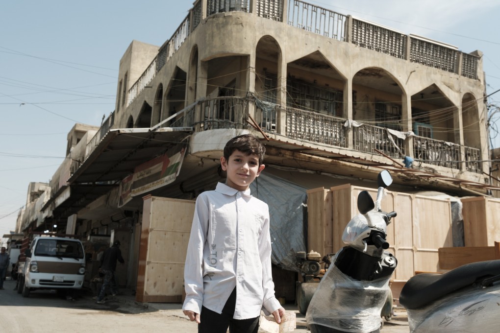 Innocence, by Thomas Chan, features a boy with a bright smile who “led me to the animal enclosure in his family’s courtyard and invited me to share a cup of tea”. It is one of the photos that forms his exhibition at Wontonmeen in Sham Shui Po, Hong Kong. Photo: Thomas Chan