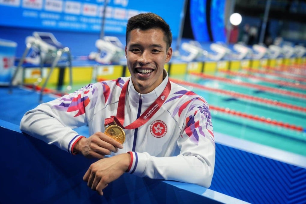 Ian Ho with his National Games men’s 50m freestyle gold medal. Photo: Elson Li