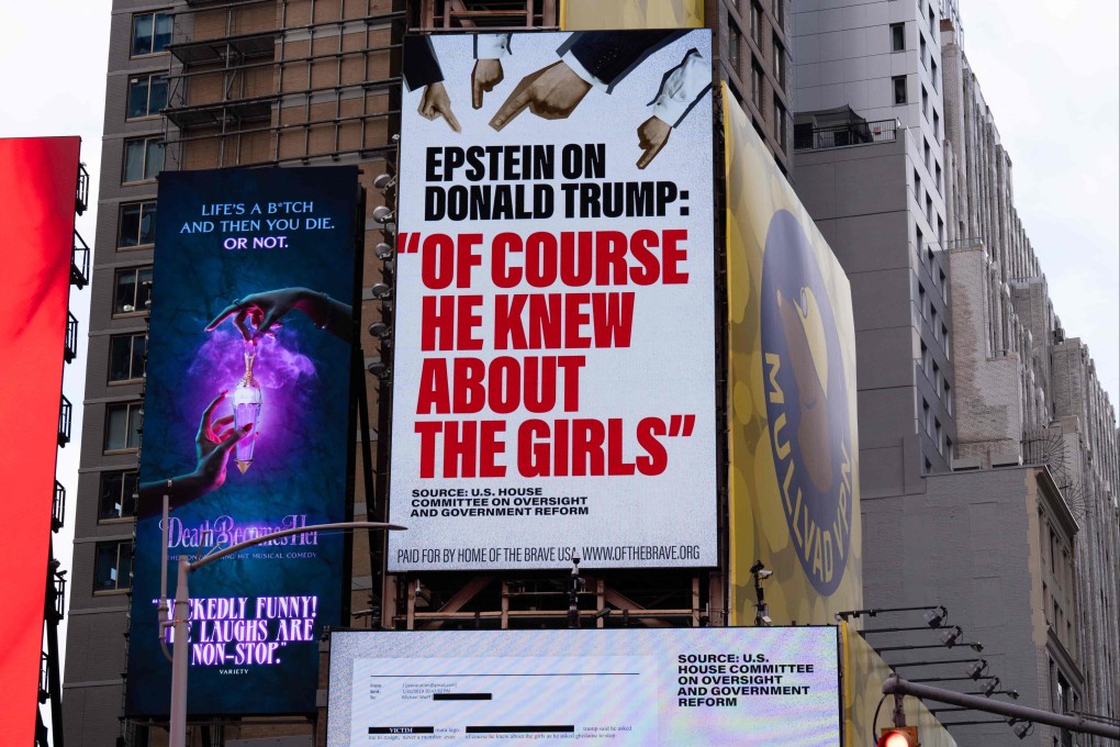 A billboard in Times Square, paid for by the group Home of the Brave, highlights Jeffrey Epstein’s comment that Donald Trump “knew about the girls”, in New York on Monday. Photo: Getty Images / AFP