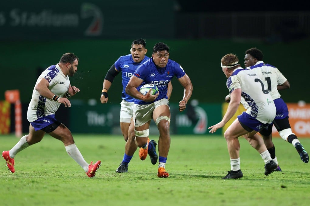 Miracle Fai’ilagi of Samoa on the charge against Namibia during the final qualification tournament in Dubai. Photo: World Rugby via Getty Images