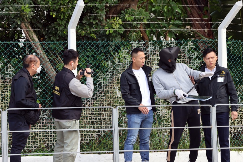 One of the suspects is brought to Fo Tan for a reconstruction of the crime in a previous arrangement. Photo: Jelly Tse