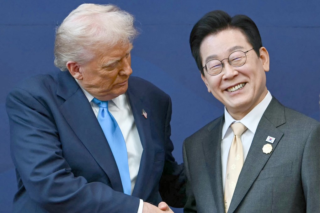 US President Donald Trump shakes hands with South Korean President Lee Jae-myung at a ceremony in Gyeongju, South Korea, on October 29. Photo: Getty Images/TNS/AFP