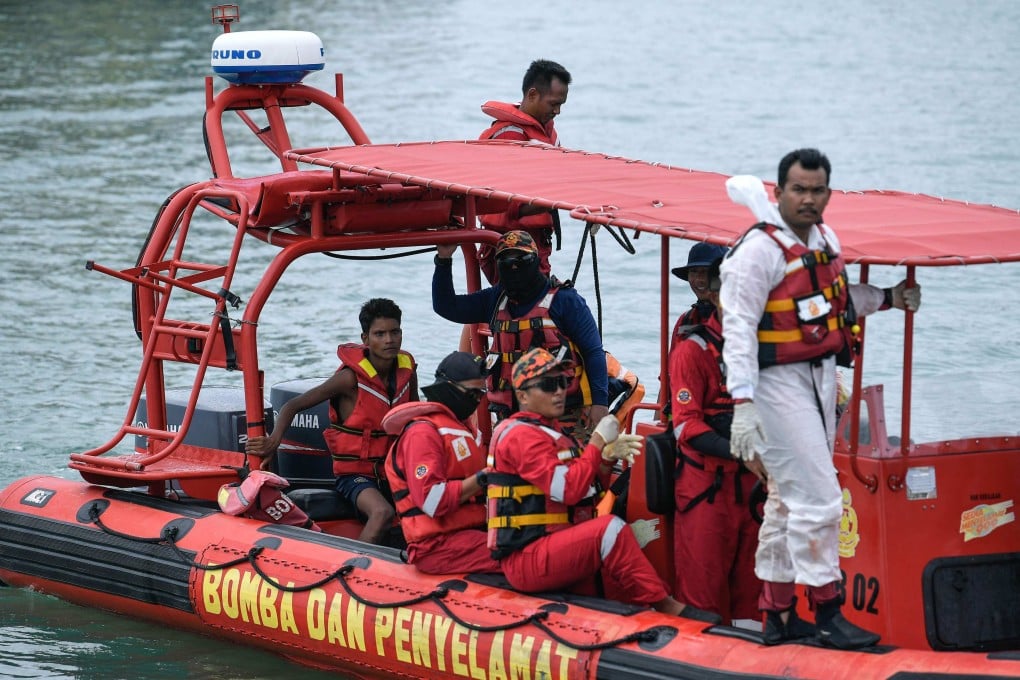 Rescuers approached a Langkawi jetty earlier this month after saving Rohingya migrant Iman Shorif (left). His boat, carrying migrants from Myanmar, had capsized days earlier near the Malaysia-Thailand border. Photo: AFP