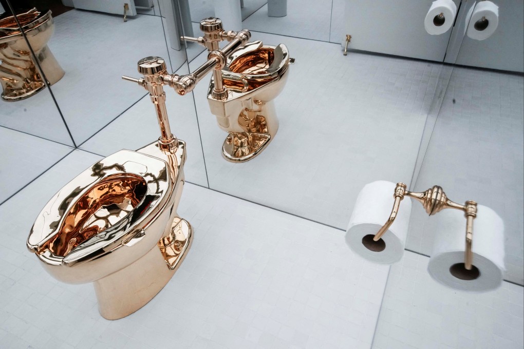 Maurizio Cattelan’s ‘America’, a fully functional solid gold toilet. Photo: Reuters