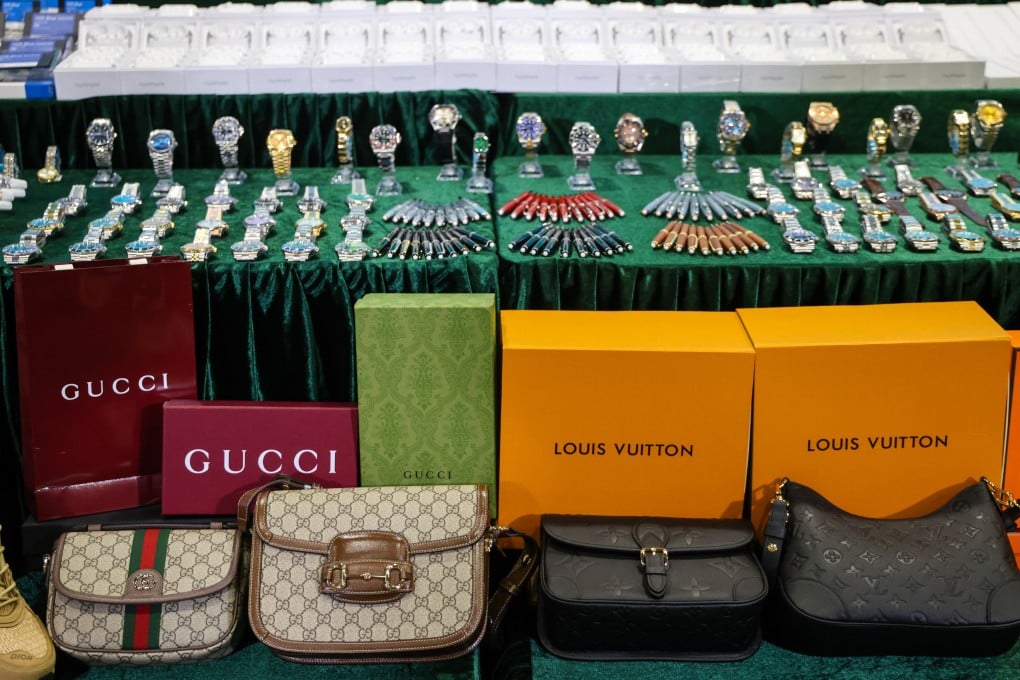 Customs officers have seized 120,000 counterfeit items, including handbags, mobile phones and watches worth HK$65 million. Photo: Jelly Tse