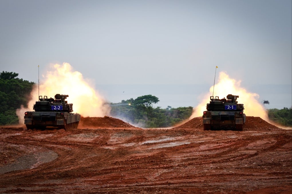 Two US-made M1A2T tanks fire during military exercises in Hsinchu county, Taiwan. A Senate hearing has been told that Washington is still far from delivering the military capabilities it has pledged to Taiwan. Photo: EPA
