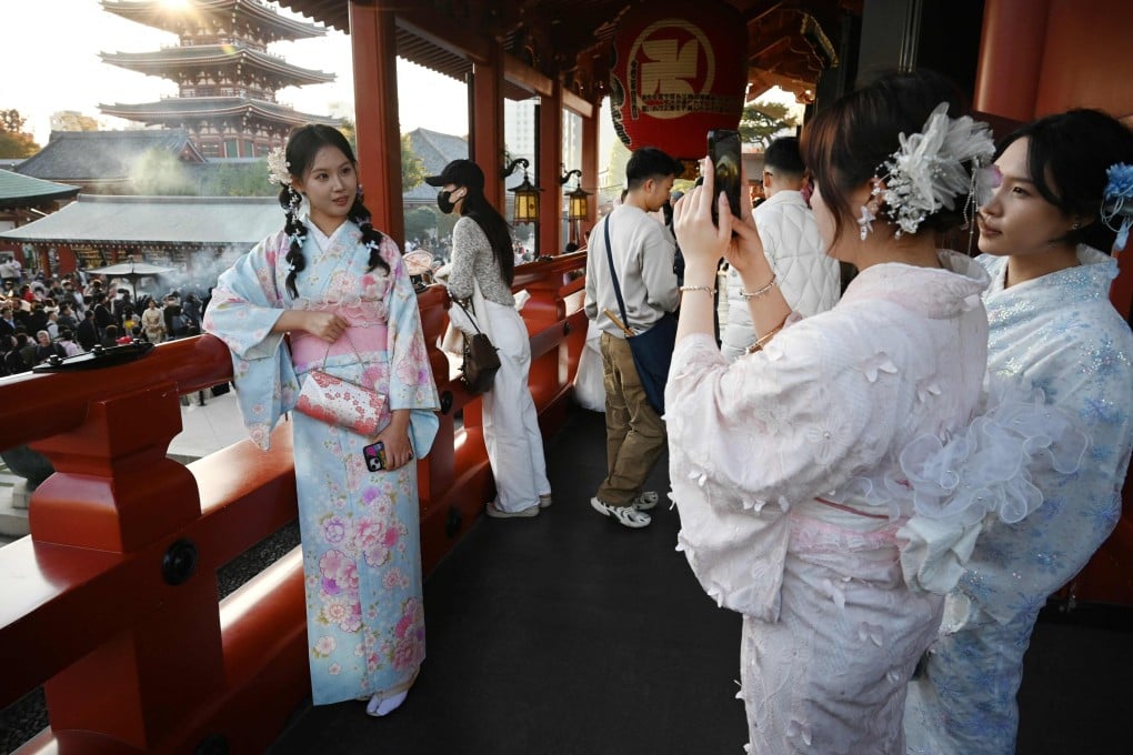 Tourists visit Sensoji Temple in Tokyo’s Asakusa district. The Education Bureau has confirmed that Hong Kong will withdraw from a student exchange programme this year. Photo: AFP