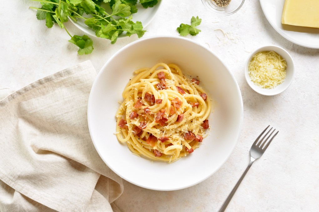 Pasta carbonara is sometimes made with pancetta, but the traditional ingredient is guanciale. Photo: Shutterstock