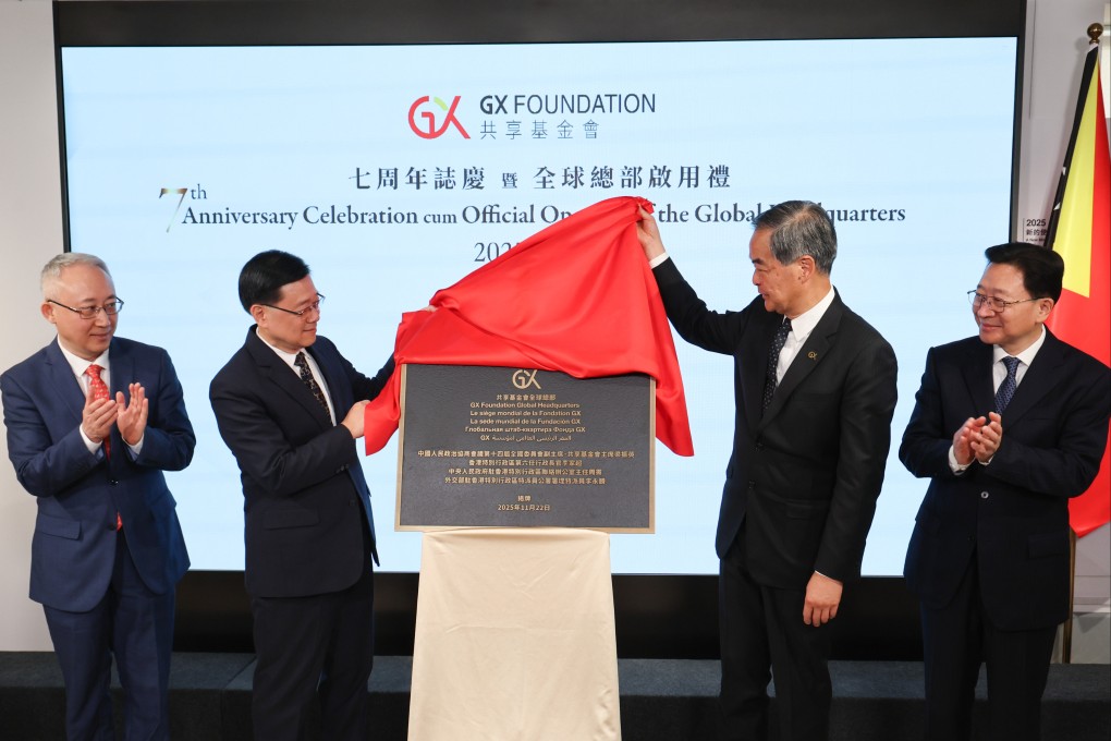 City leader John Lee (second left) former chief executive Leung Chun-ying (second right) attend the ceremony for charity GX Foundation. Photo: Dickson Lee
