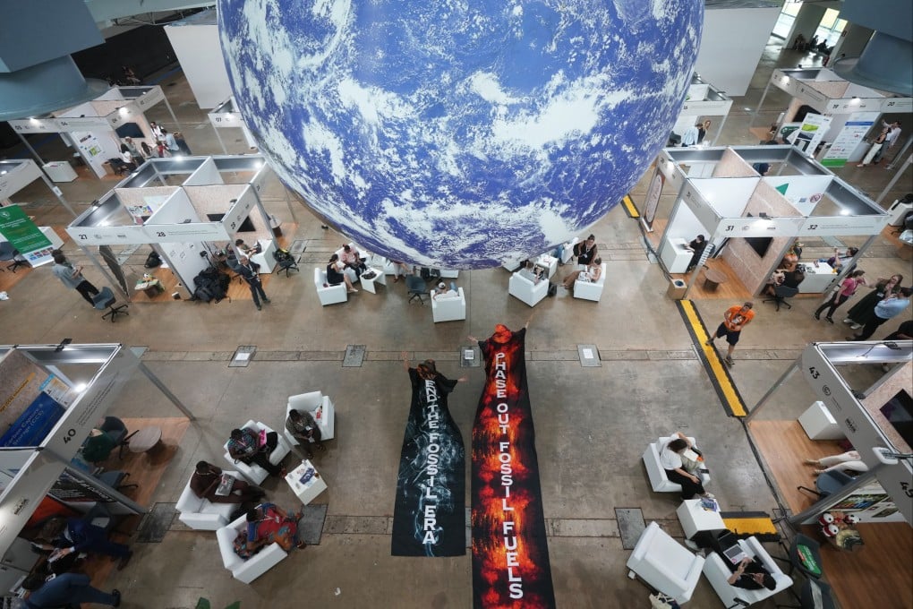 Activists call for the end of the use of fossil fuels at the Cop30 climate summit in Belem, Brazil, on Thursday. Photo: AP
