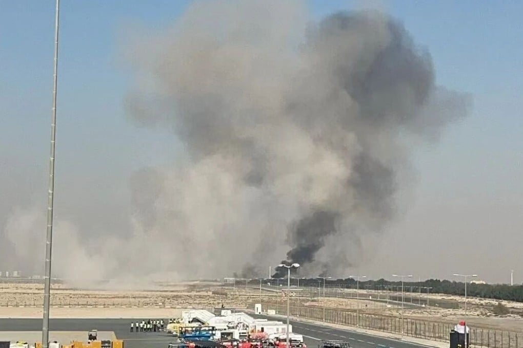 Smoke billows from the site of an Indian fighter jet crash during a demonstration at the Dubai Air Show on Friday. Photo: Xinhua