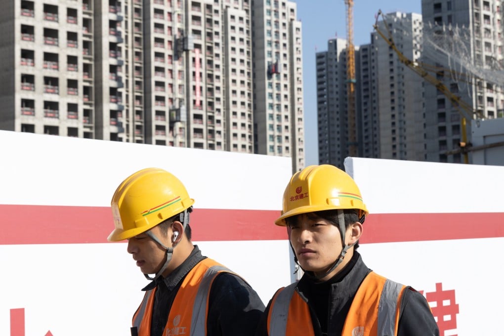 Unfinished buildings in Beijing. Most global banks have dim outlooks for China’s real estate sector, which has been experiencing a renewed sales slump since the second quarter. Photo: EPA