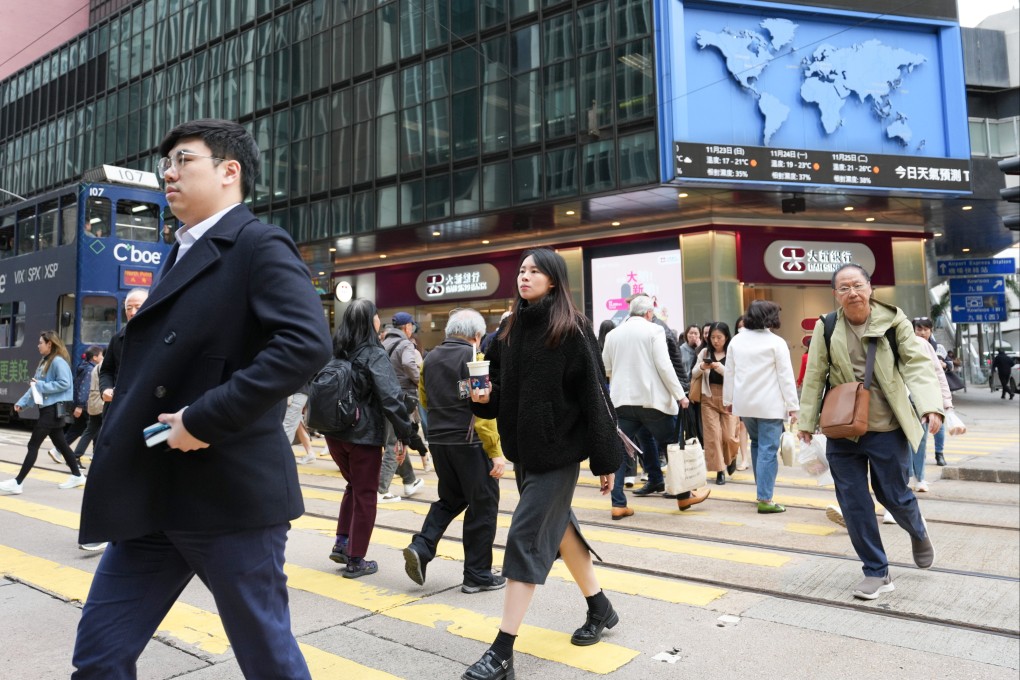 Commuters in Hong Kong’s Central district on November 19.  The Hong Kong government should consider revising current visa policies to strengthen its role as a regional hub for talent. Photo: Jelly Tse