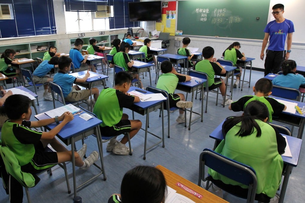 Pupils take part in the Territory-wide System Assessment, at the Tsuen Wan Trade Association Primary School in Tsing Yi. Photo: Roy Issa