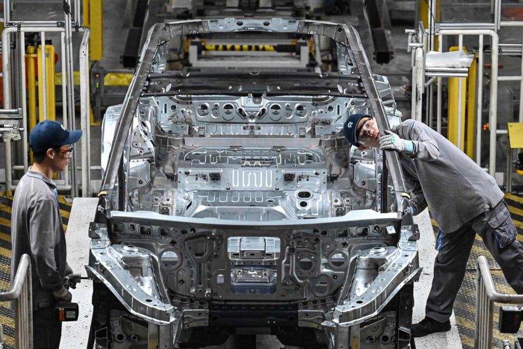 Employees work on an electric vehicle production line at a factory of Chinese automaker NIO in Hefei, in eastern China’s Anhui province on September 24, 2025. Photo: AFP