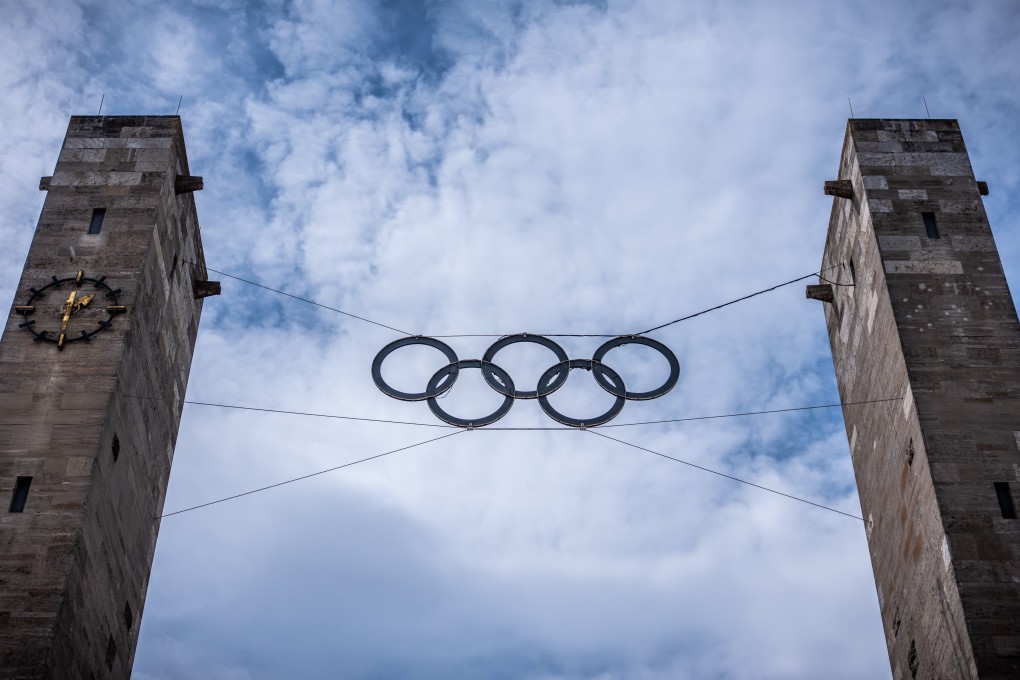 The Olympic rings hanging from the Olympic Stadium in Berlin. About two-thirds of residents are against a bid to host the Games. Photo: dpa