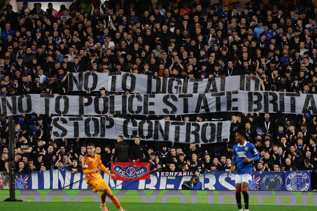 Football fans display banners against a digital ID - a plan that is highly controversial in the UK. Photo: Reuters
